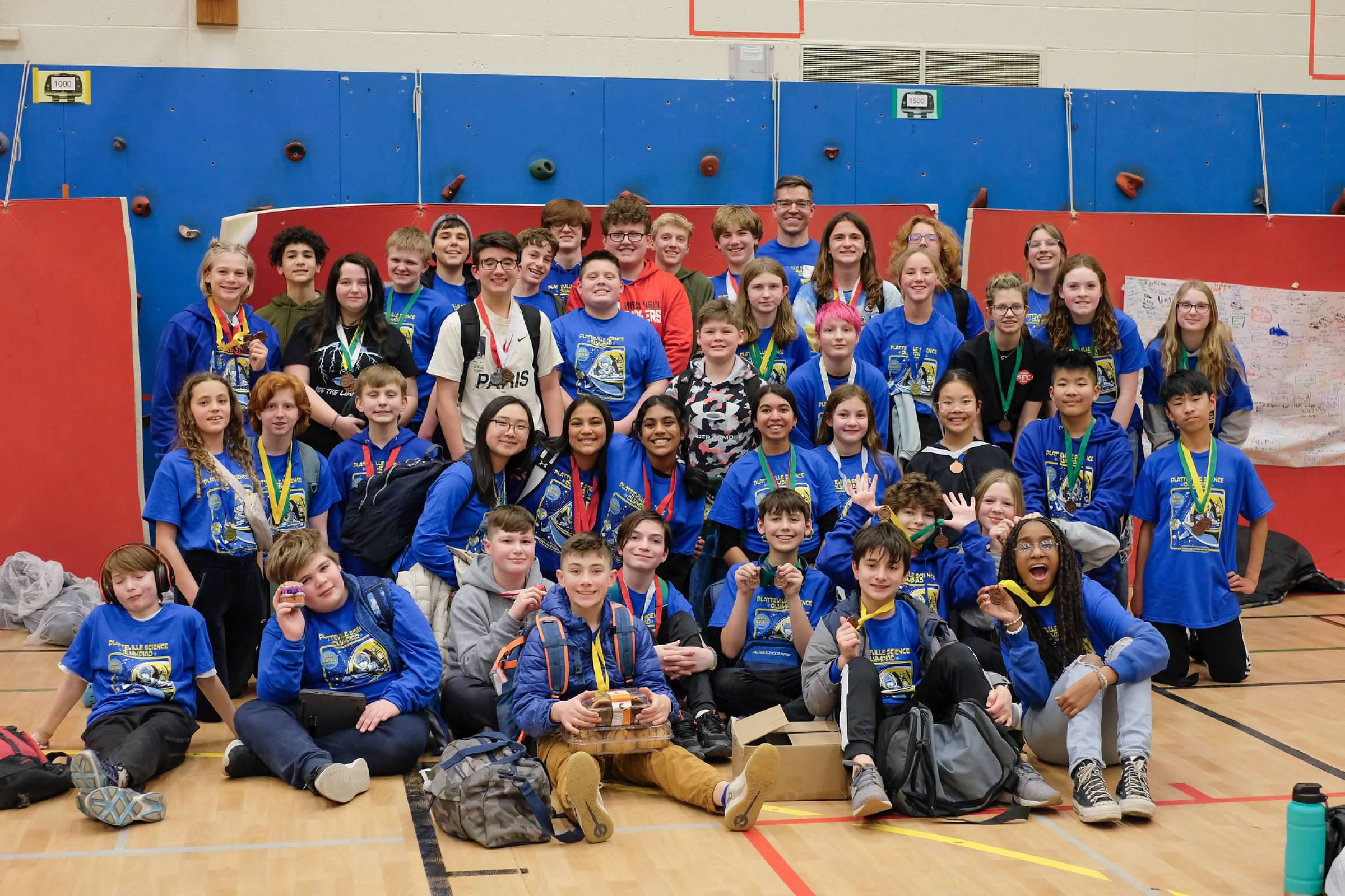 happy students after receiving their medals